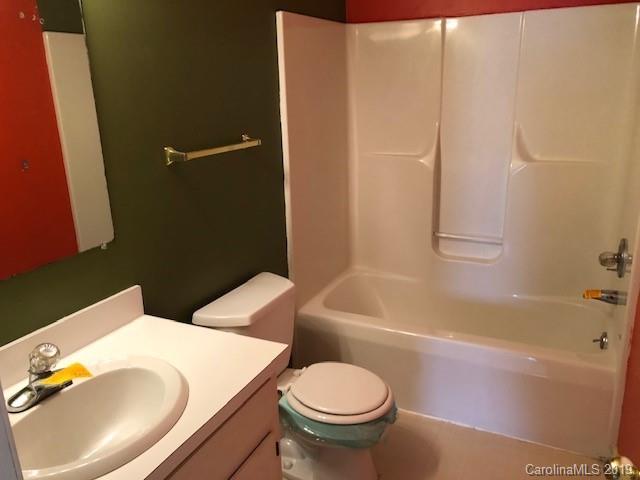483 Shiloh Unity Road Lancaster, SC 29720 - Photo 19 of 22 a bathroom with a sink toilet and shower