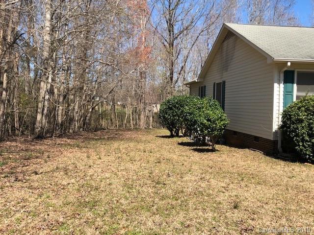 483 Shiloh Unity Road Lancaster, SC 29720 - Photo 9 of 22 a backyard of a house