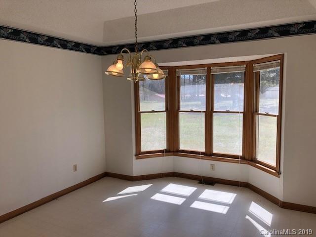483 Shiloh Unity Road Lancaster, SC 29720 - Photo 10 of 22 a view of an empty room with a window