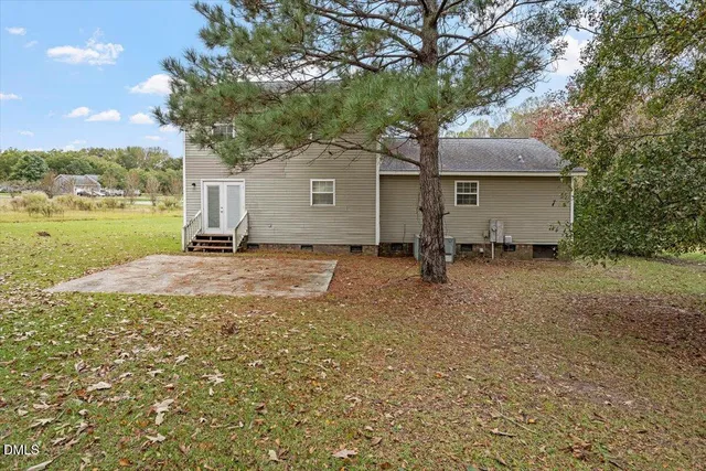 a house view with a garden space