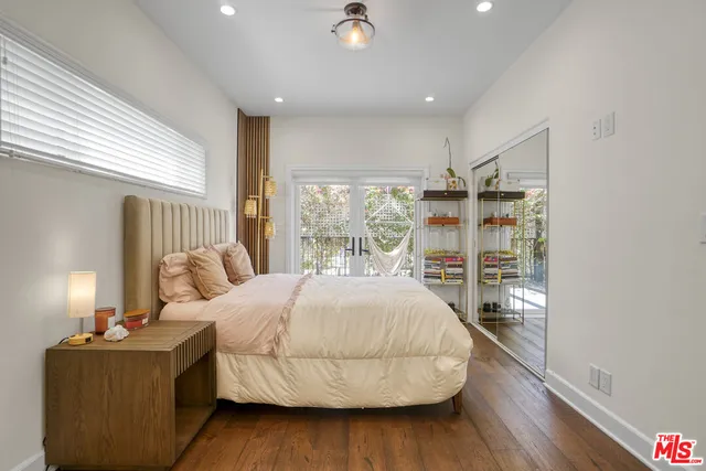 a bathroom with a shower sink and mirror