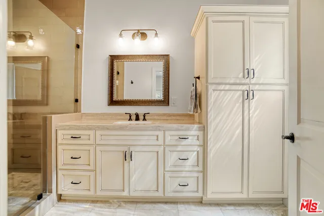 a view of a two chairs in the balcony