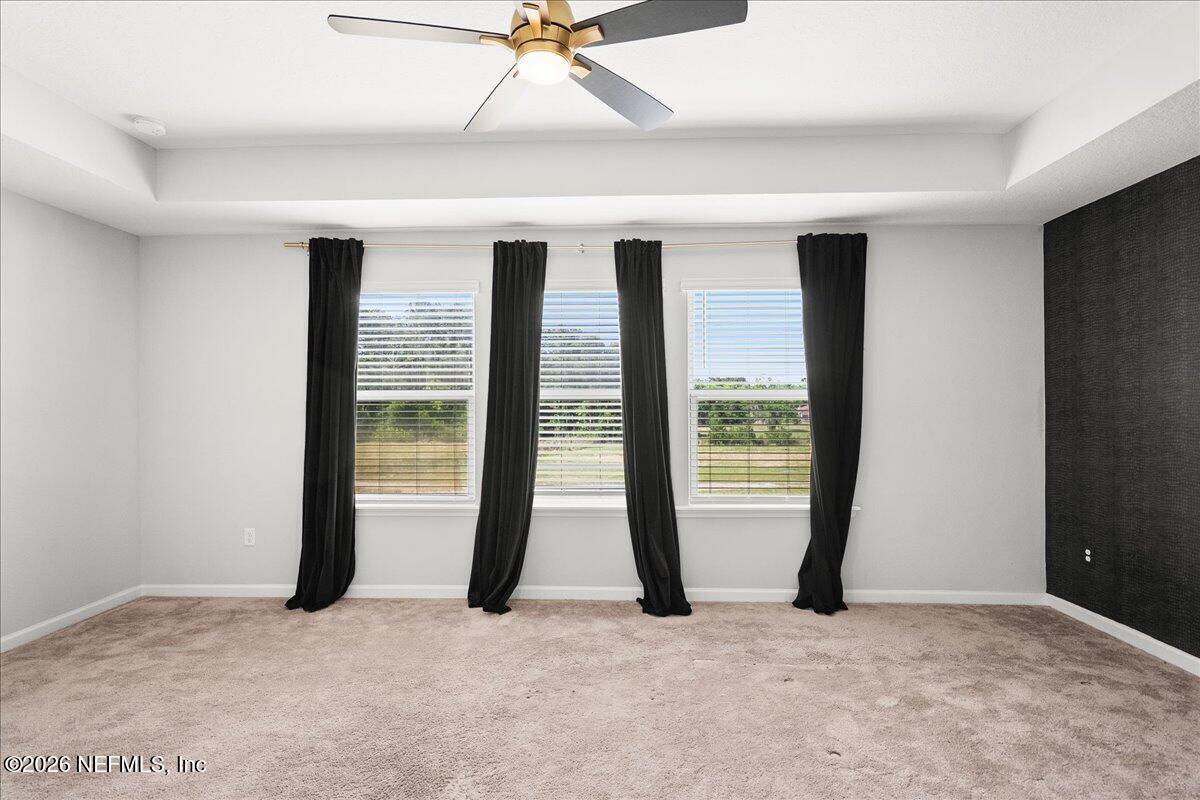 5645 Hampton Creek Road Jacksonville, FL 32218 - Photo 30 of 41 Owners Suite Bedroom