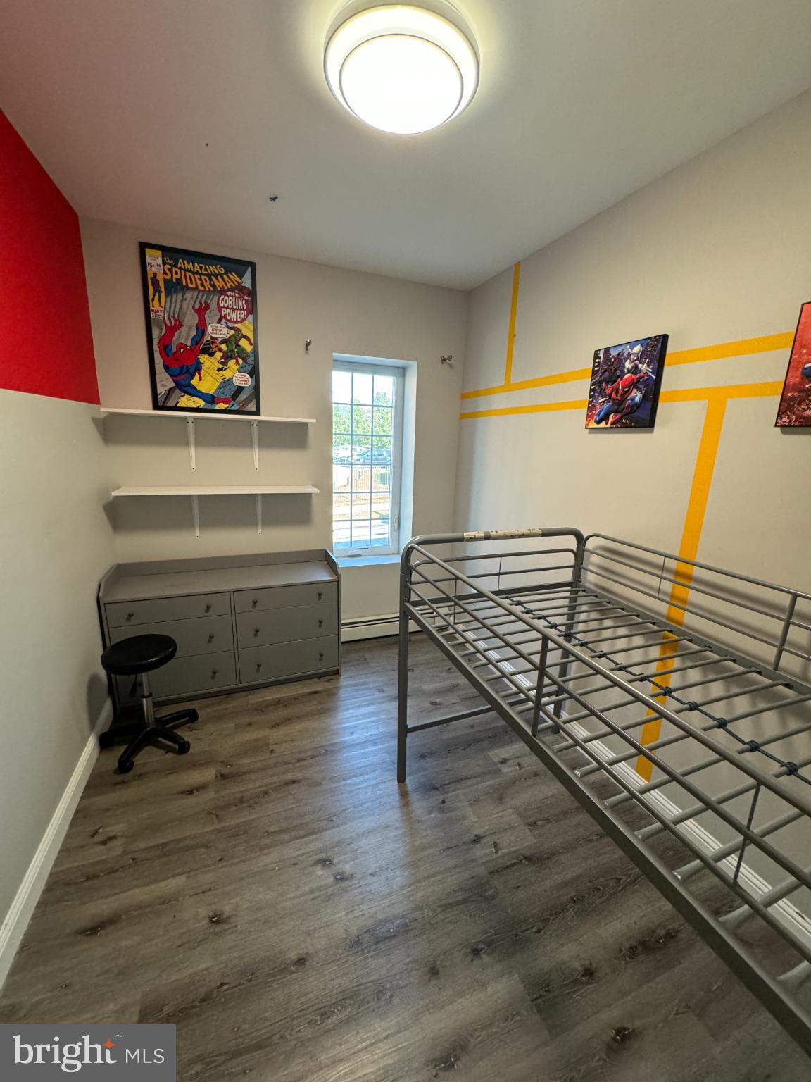 601 Lancaster Avenue, Unit 3 Reading, PA 19611 - Photo 7 of 11 Vibrant, playful room with superhero flair.