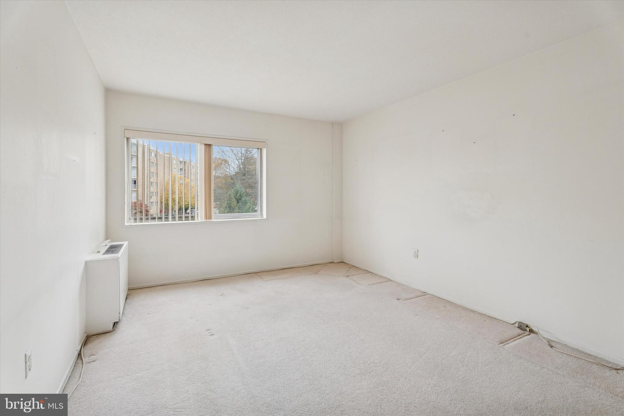 100 West Avenue, Unit 329S Jenkintown, PA 19046 - Photo 13 of 19 an empty room with windows