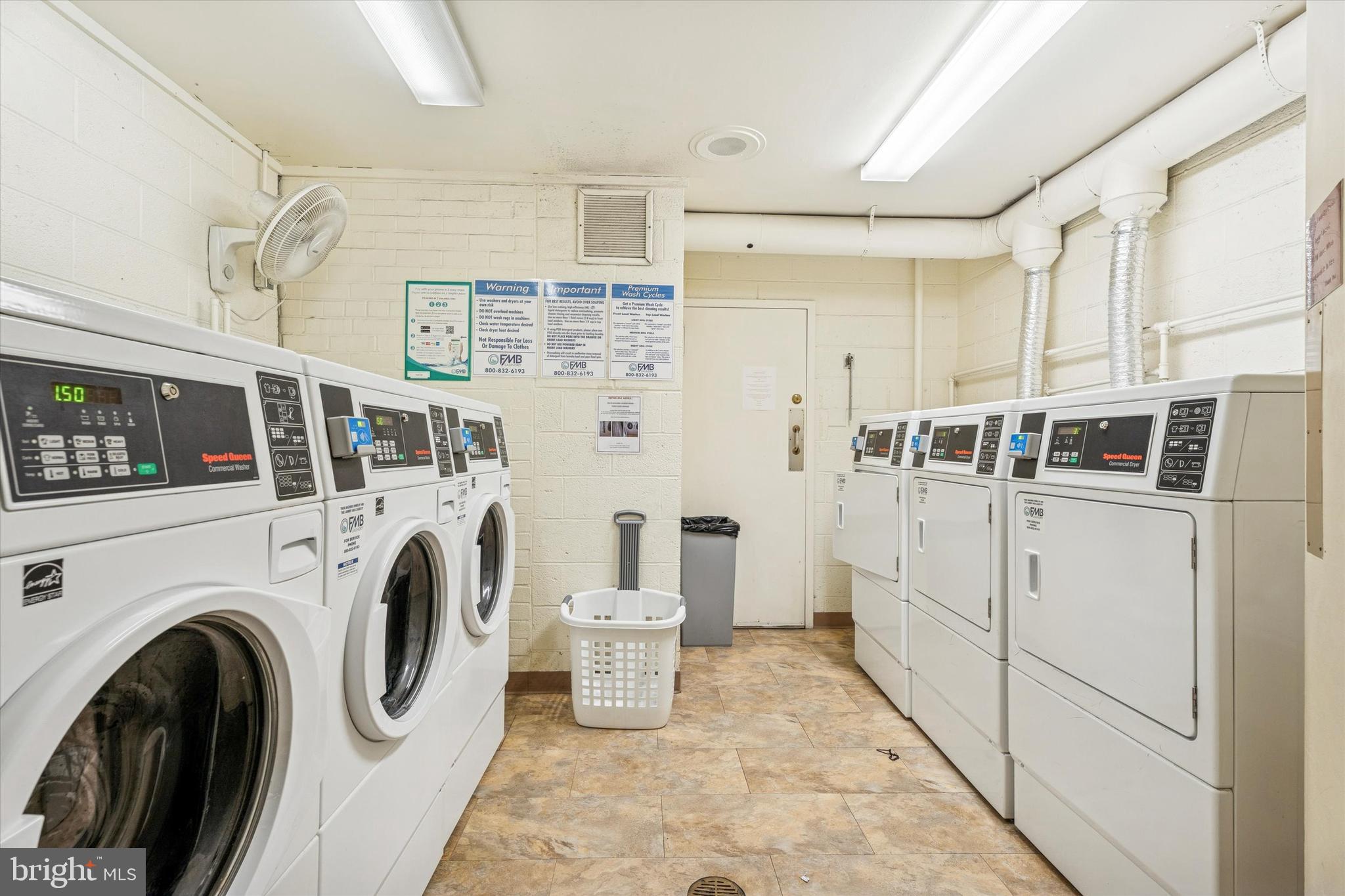 100 West Avenue, Unit 329S Jenkintown, PA 19046 - Photo 18 of 19 a utility room with dryer and washer