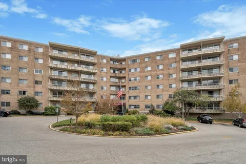 a building view with sitting space and garden view