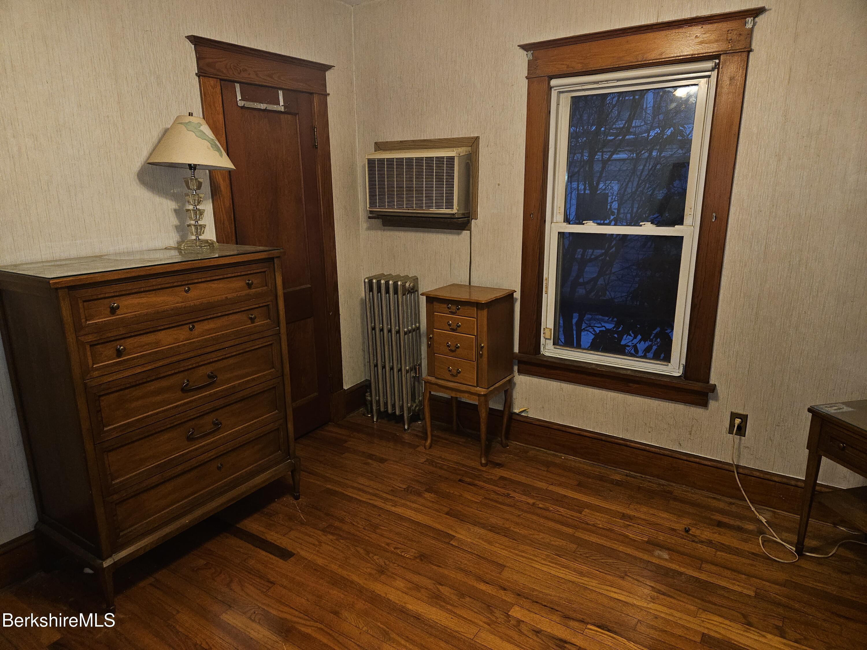 269 2nd Street Pittsfield, MA 01201 - Photo 19 of 39 a view of room with a door and wooden floor