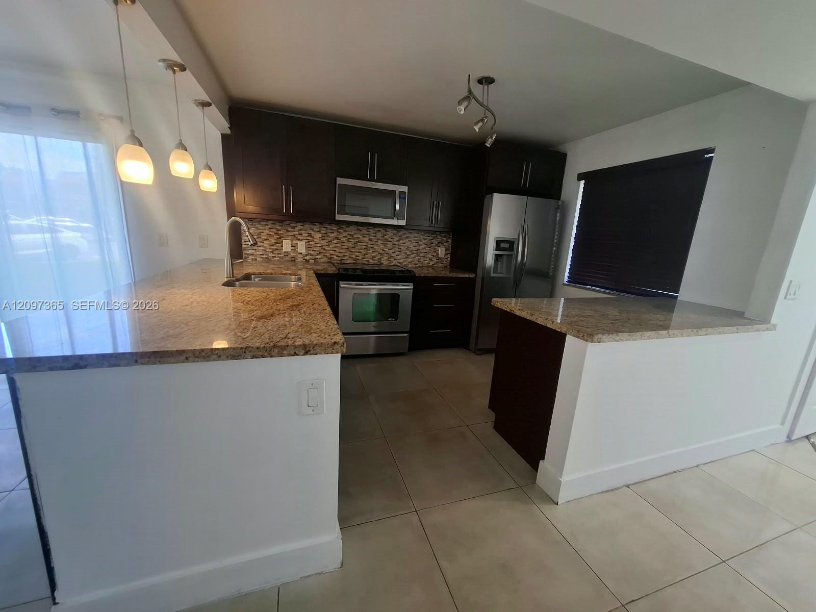 320 Racquet Club Road, Unit 104 Weston, FL 33326 - Photo 2 of 28 Gallery Image 2