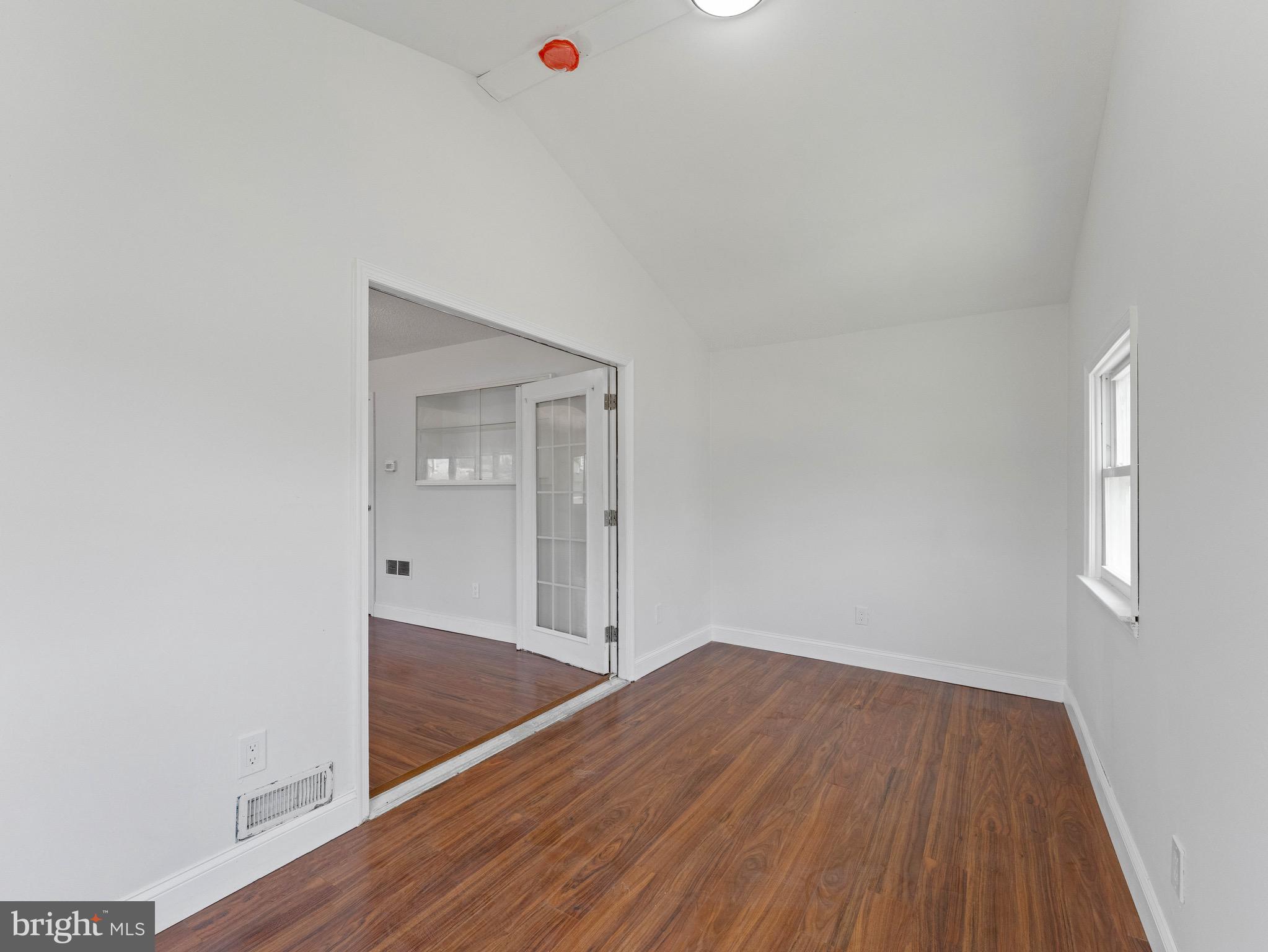 157 West Browning Road Bellmawr, NJ 08031 - Photo 15 of 41 a view of a small space with wooden floor and a window