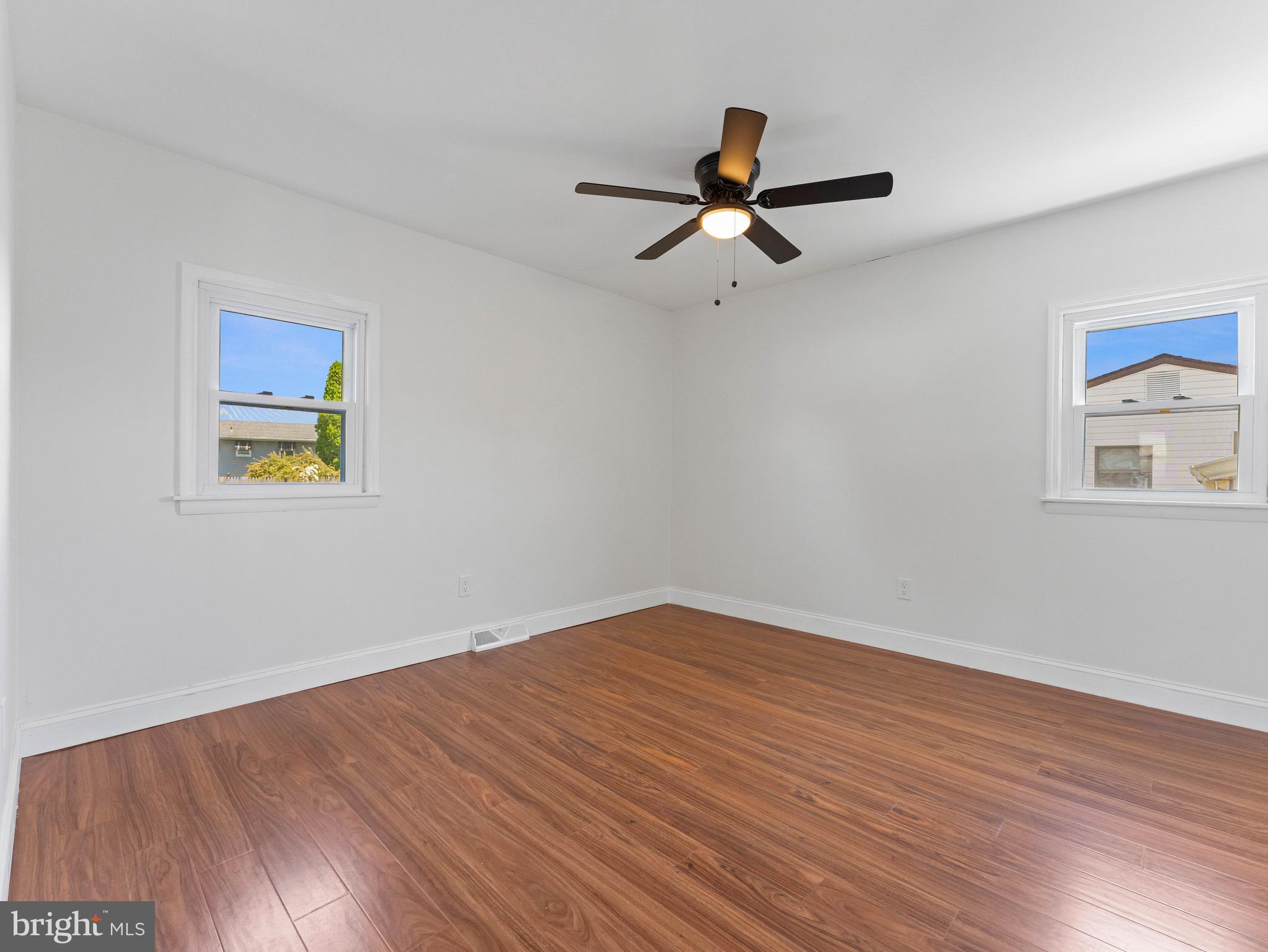 157 West Browning Road Bellmawr, NJ 08031 - Photo 16 of 41 a view of empty room with wooden floor