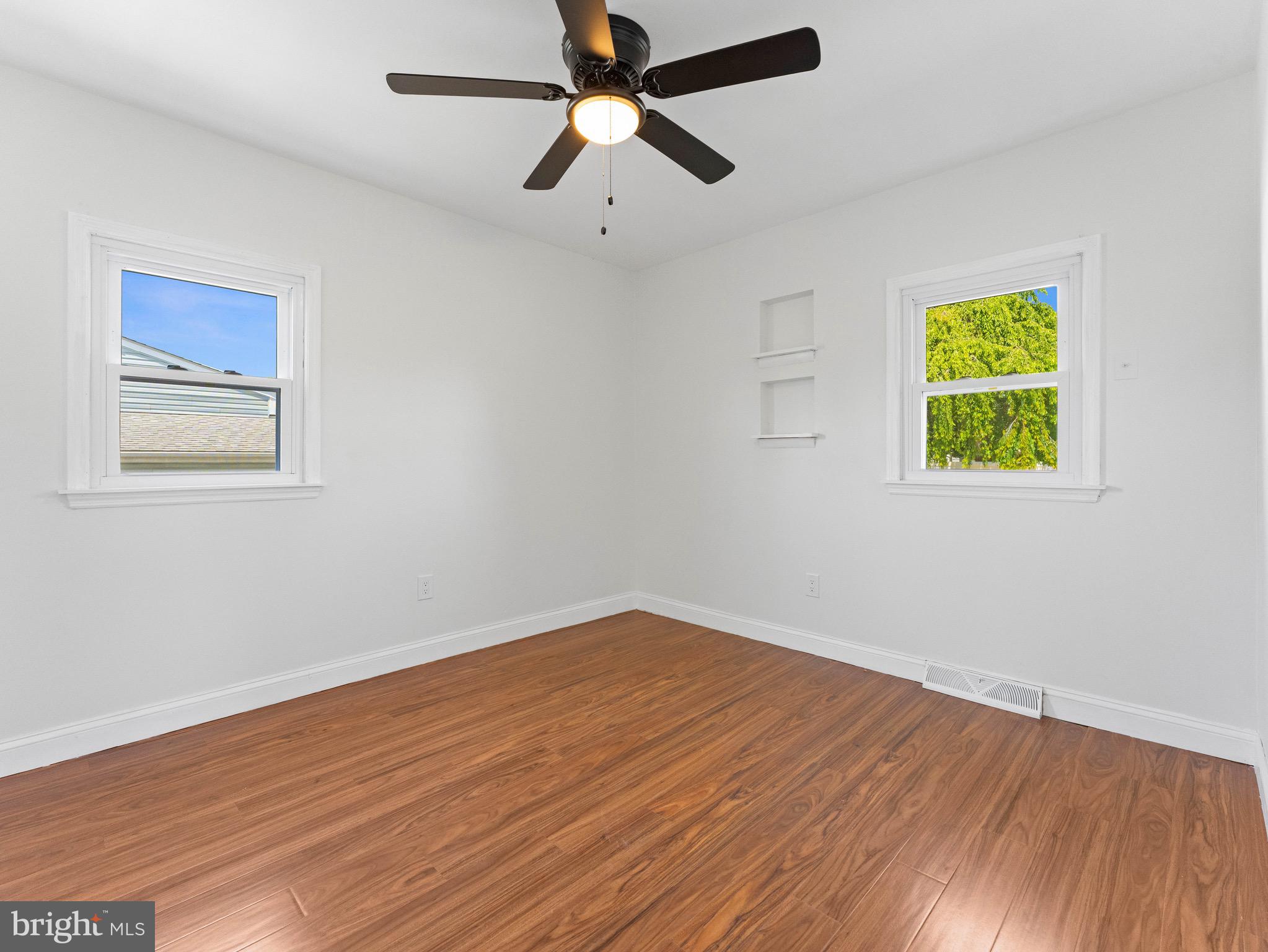 157 West Browning Road Bellmawr, NJ 08031 - Photo 18 of 41 a view of room with hardwood floor and window