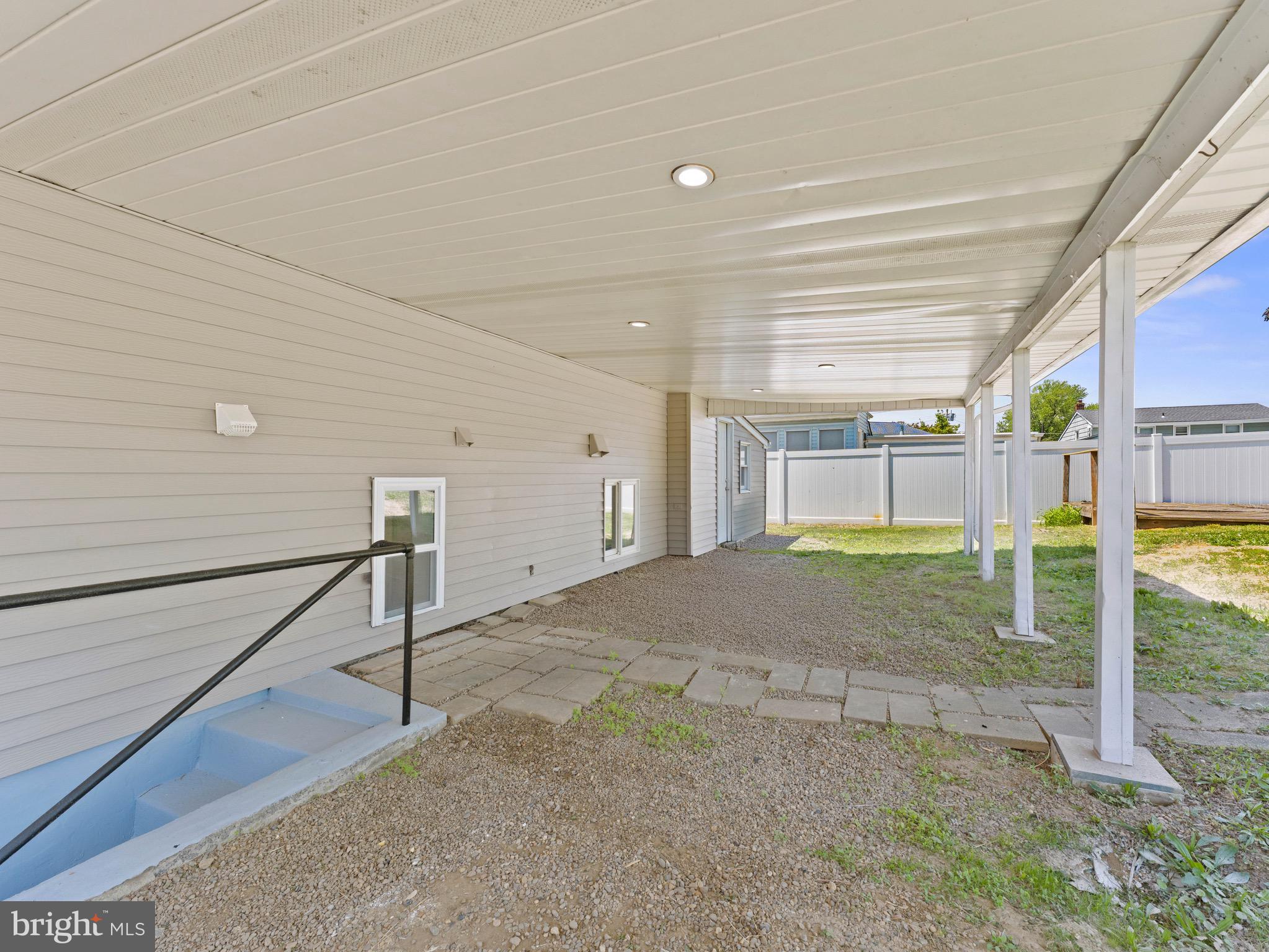 157 West Browning Road Bellmawr, NJ 08031 - Photo 33 of 41 a view of a big room with floor to ceiling windows and stairs