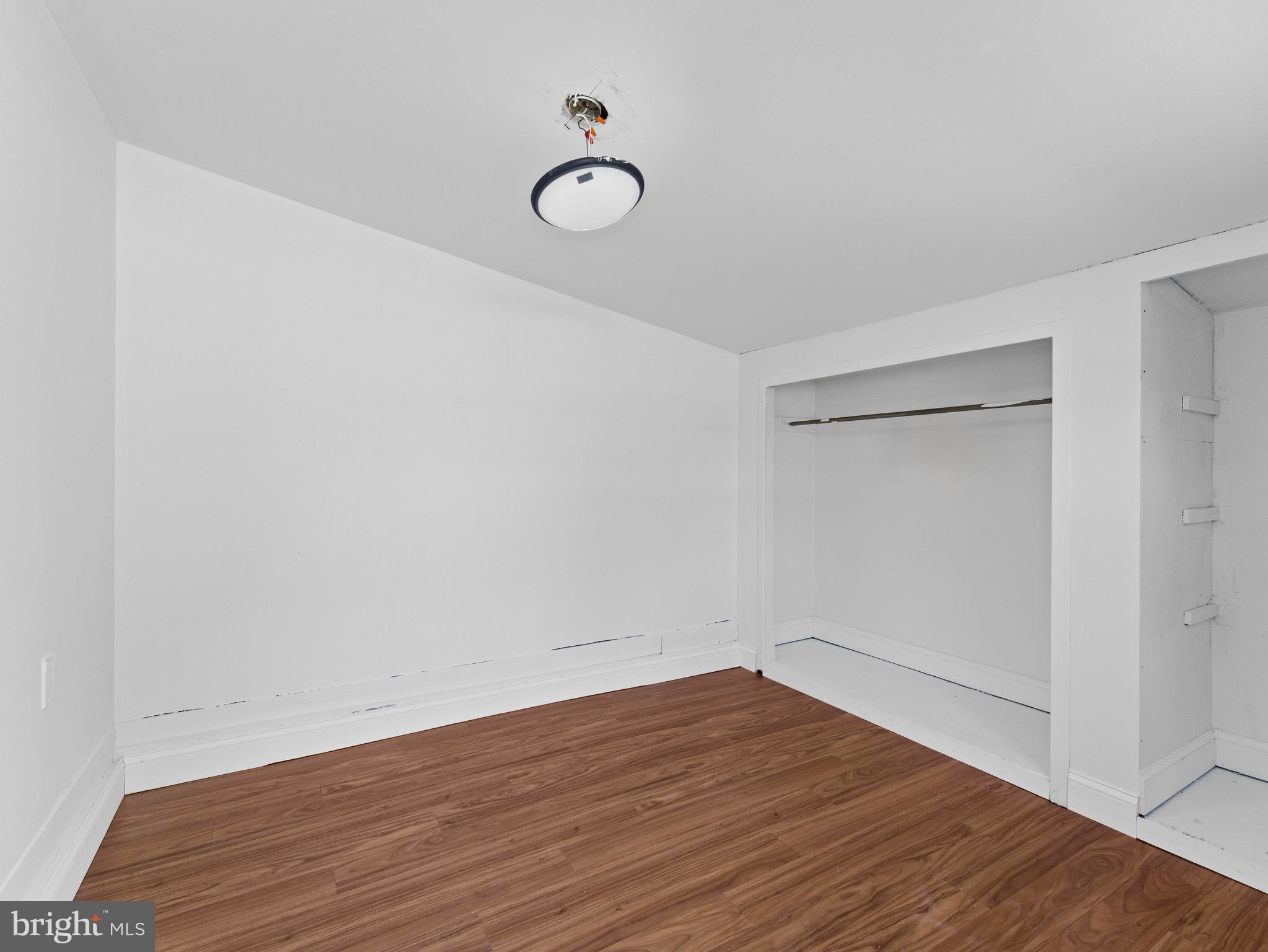 157 West Browning Road Bellmawr, NJ 08031 - Photo 35 of 41 a view of empty room with wooden floor