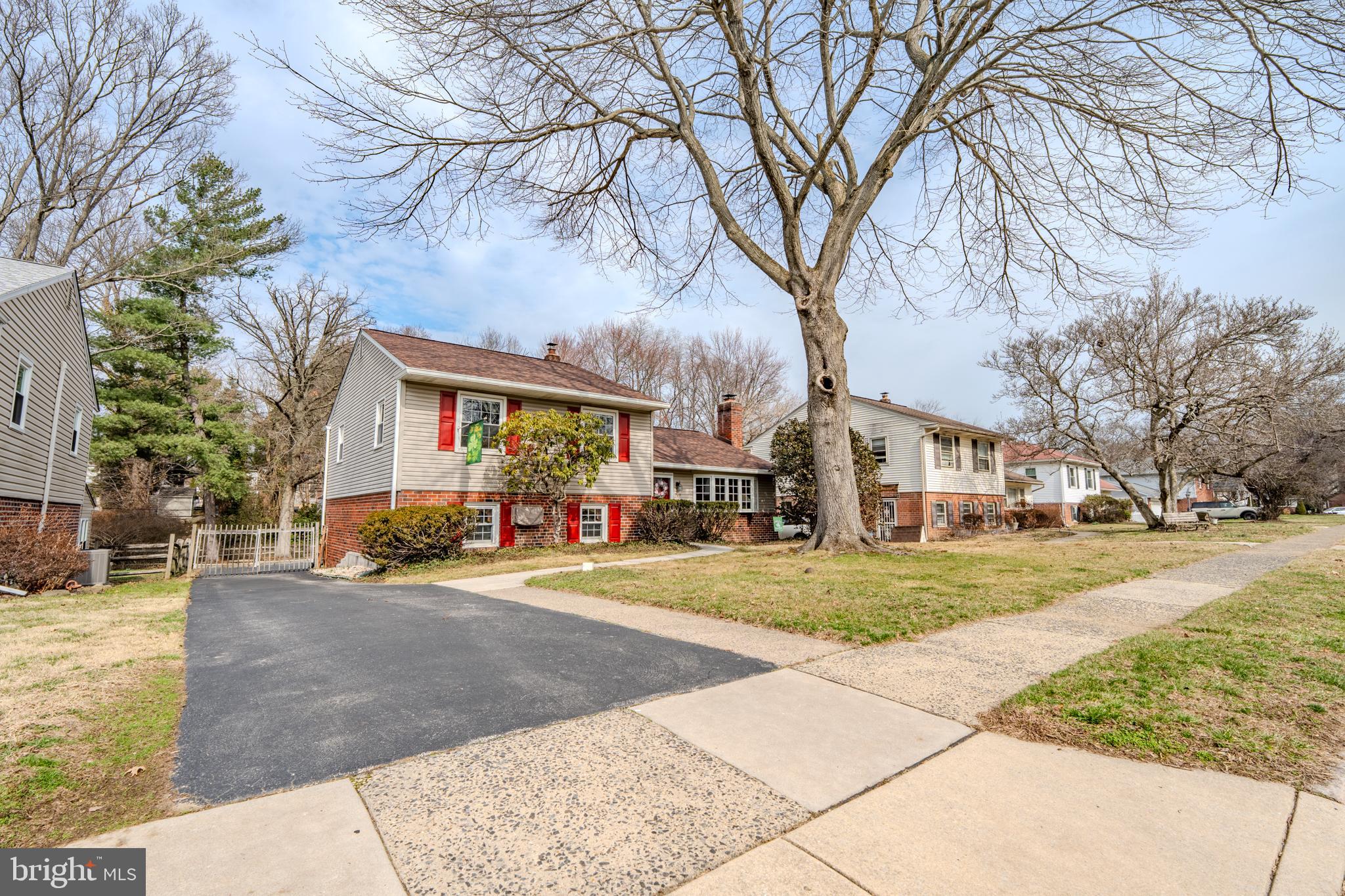 a view of road with card and patio