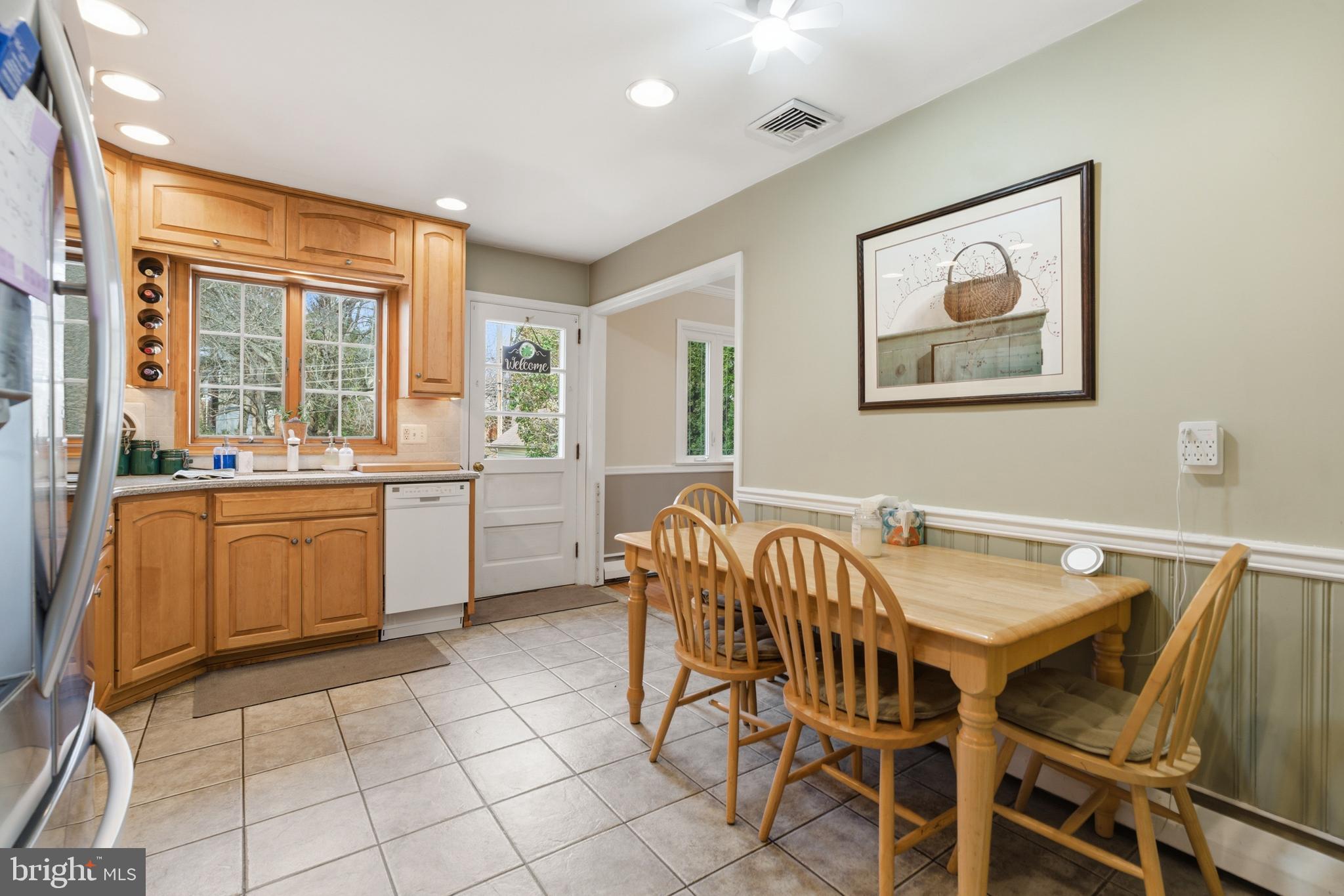 720 Evans Road Springfield, PA 19064 - Photo 13 of 38 a view of a dining room with furniture and window