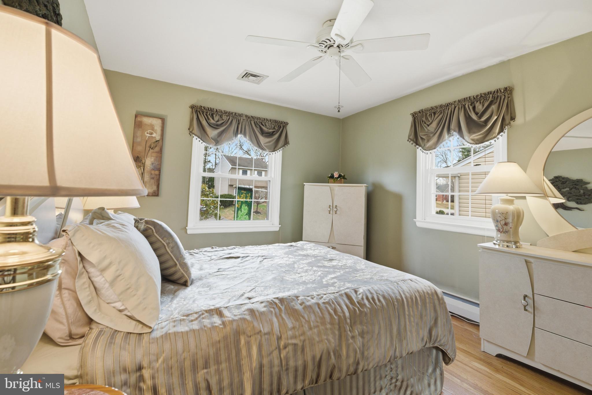 720 Evans Road Springfield, PA 19064 - Photo 18 of 38 a bedroom with a bed and a window