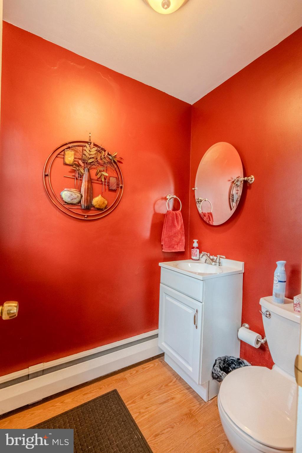 720 Evans Road Springfield, PA 19064 - Photo 28 of 38 a bathroom with a toilet and a sink