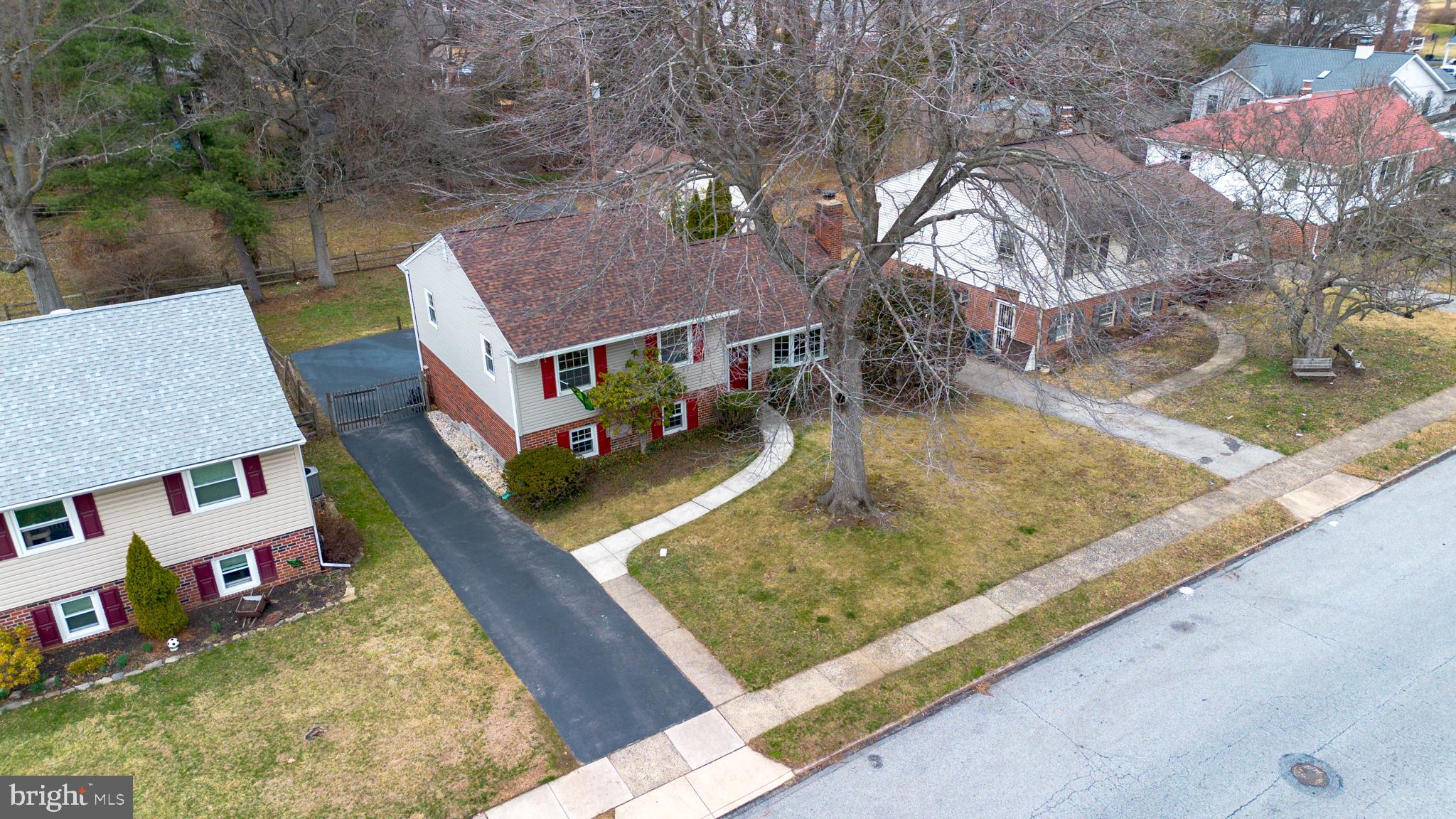 720 Evans Road Springfield, PA 19064 - Photo 4 of 38 swimming pool with couple of relaxing chair