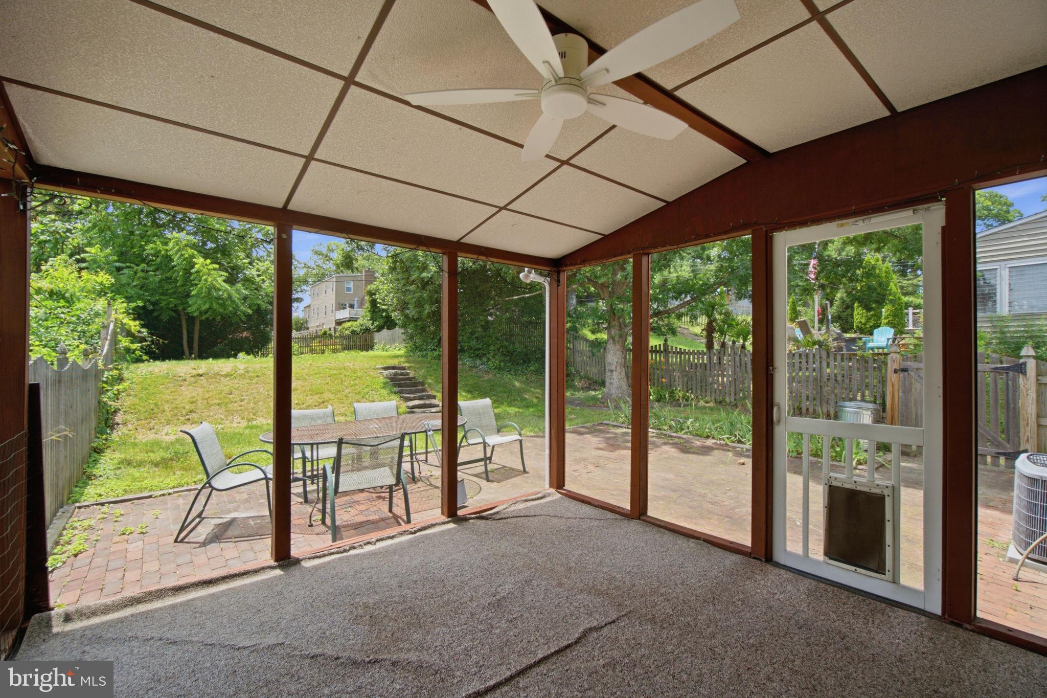107 Oakway Road Lutherville-Timonium, MD 21093 - Photo 43 of 52 Screened porch overlooking the backyard