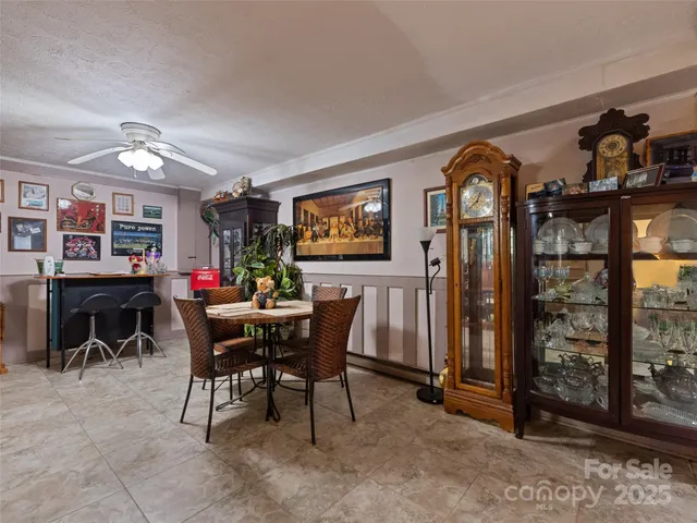a view of a livingroom with furniture and window