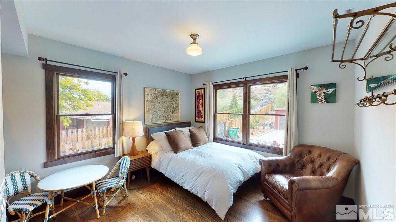 1300 Clough Road Reno, NV 89509 - Photo 12 of 40 a bedroom with furniture and a window