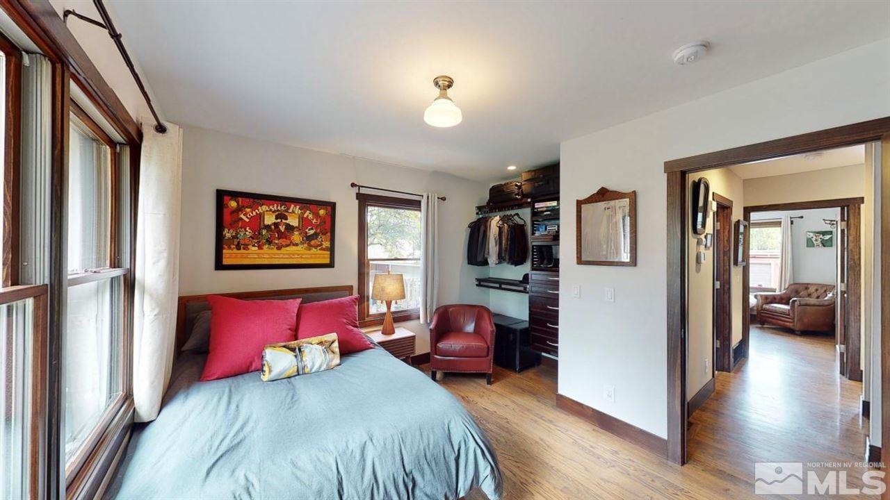 1300 Clough Road Reno, NV 89509 - Photo 16 of 40 a bedroom with furniture and a gate