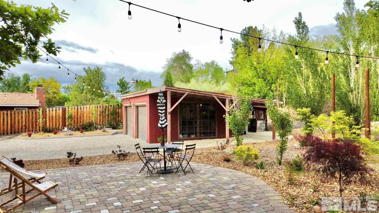 1300 Clough Road Reno, NV 89509 - Photo 37 of 40 a view of a park with plants and a bench