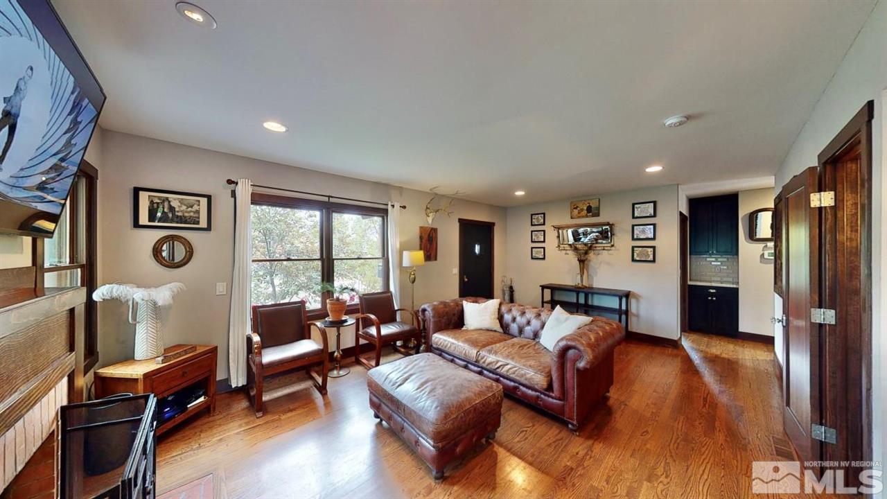 1300 Clough Road Reno, NV 89509 - Photo 4 of 40 a living room with furniture and a large window