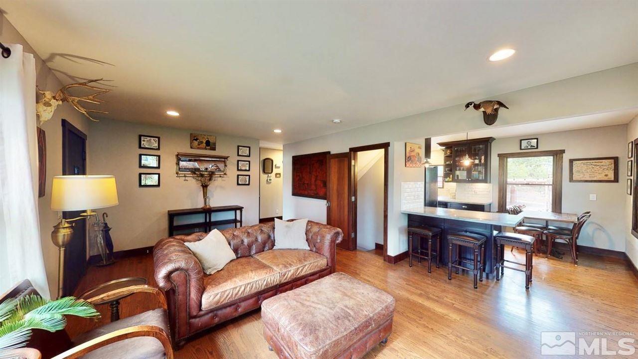 1300 Clough Road Reno, NV 89509 - Photo 5 of 40 a living room with furniture and wooden floor