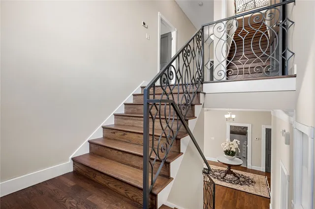 a bed room with a bed and a television