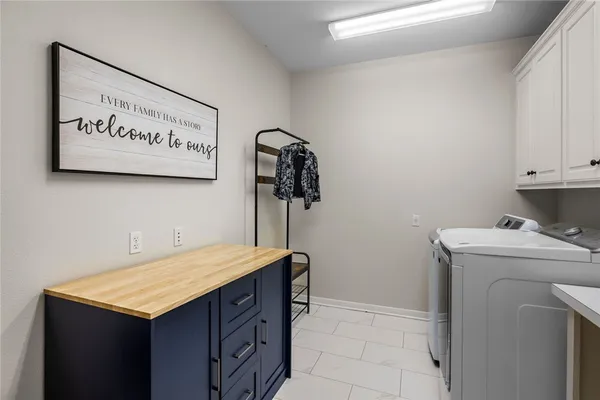 a front view of a residential apartment building with a yard