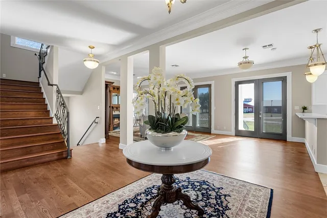 a view of a livingroom with furniture and front door