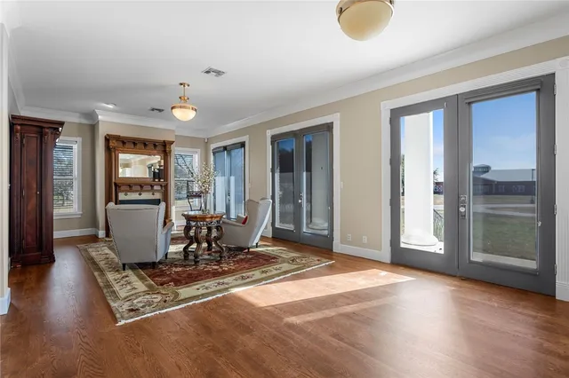 a view of a livingroom with furniture and wooden floor