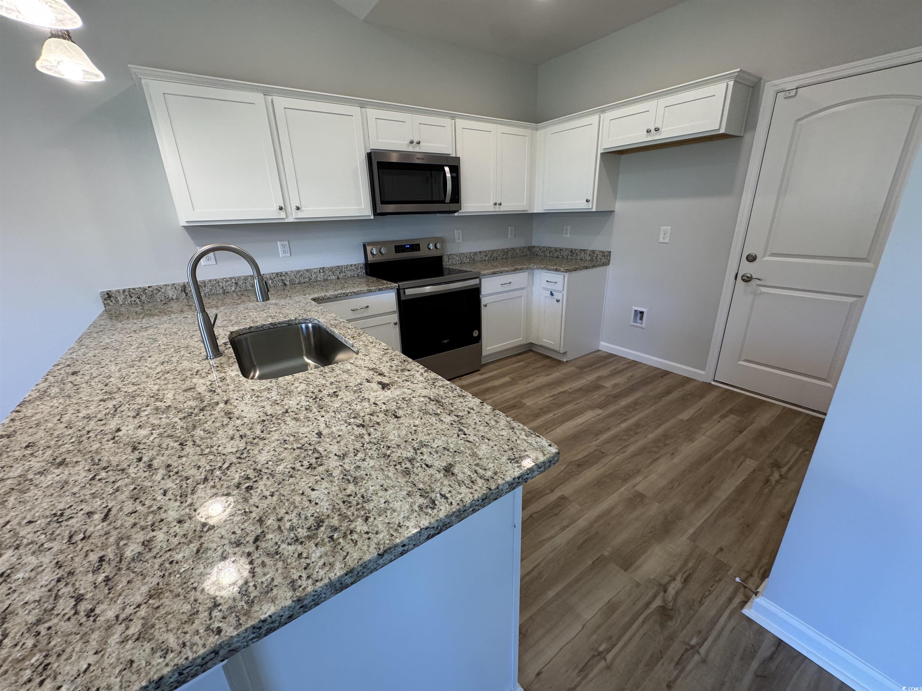 596 Shallow Cv Drive Conway, SC 29527 - Photo 14 of 25 Kitchen with stainless steel appliances, white cab
