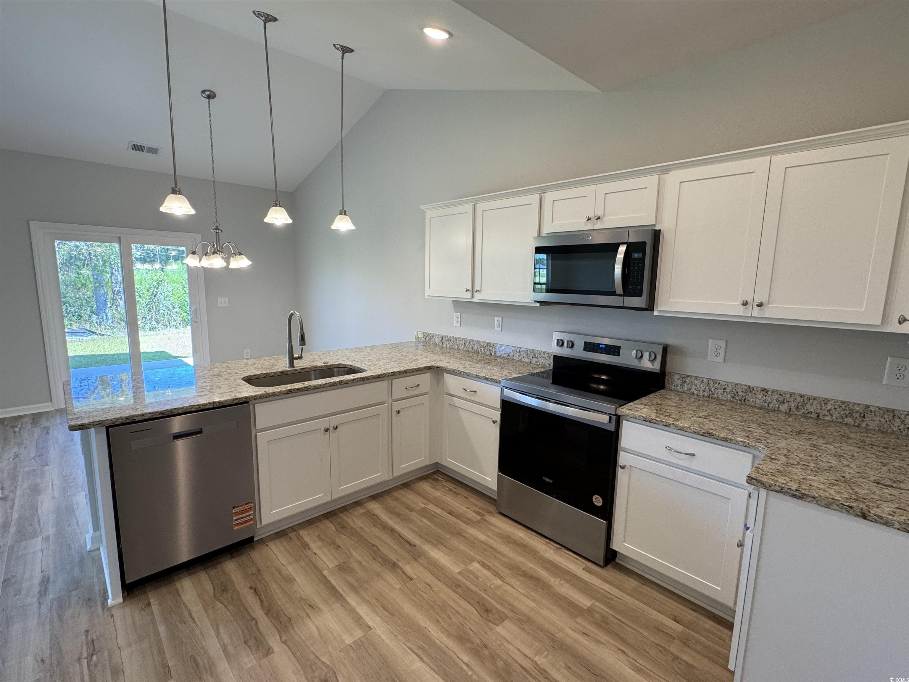 596 Shallow Cv Drive Conway, SC 29527 - Photo 15 of 25 Kitchen featuring stainless steel appliances, whit