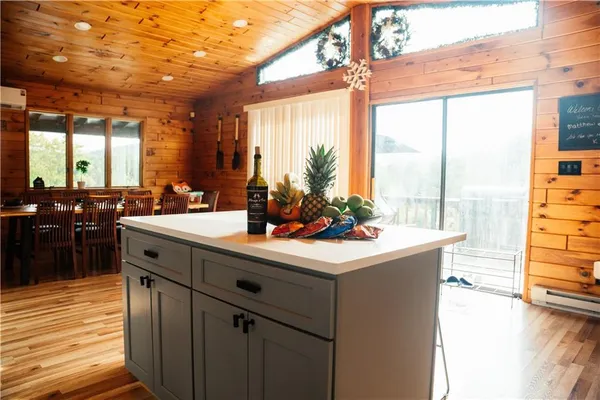 a kitchen with a sink and a stove top oven