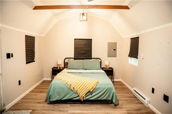 a room with a table and chairs