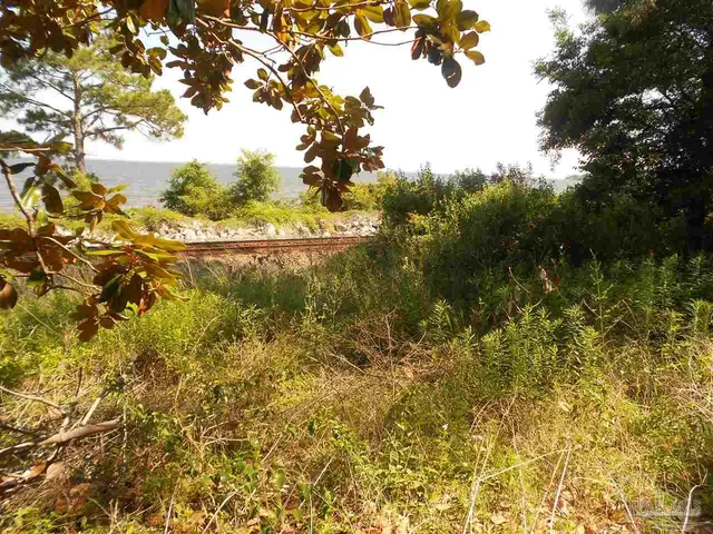 a backyard of a building with an outdoor space