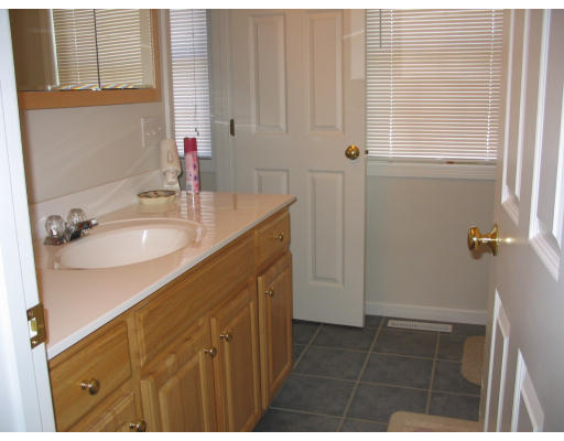 59 Ferris Street Springfield, MA 01151 - Photo 9 of 9 a bathroom with a sink and a mirror