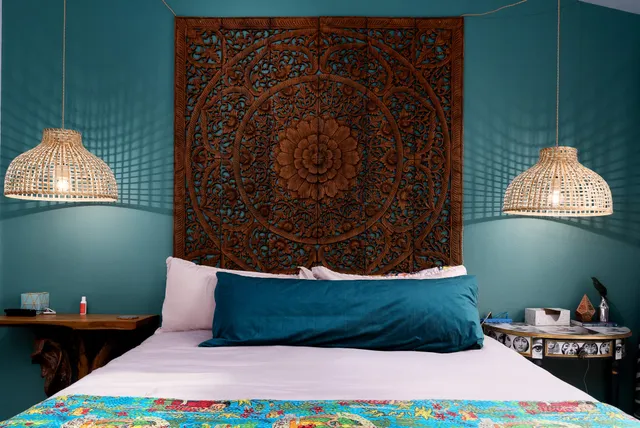 a bedroom with bed and a window