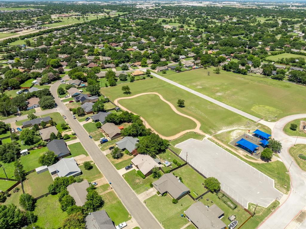 930 Vail Highlands Circle Hewitt, TX 76643 - Photo 32 of 33 a view of a balcony with a floor to ceiling window next to a yard