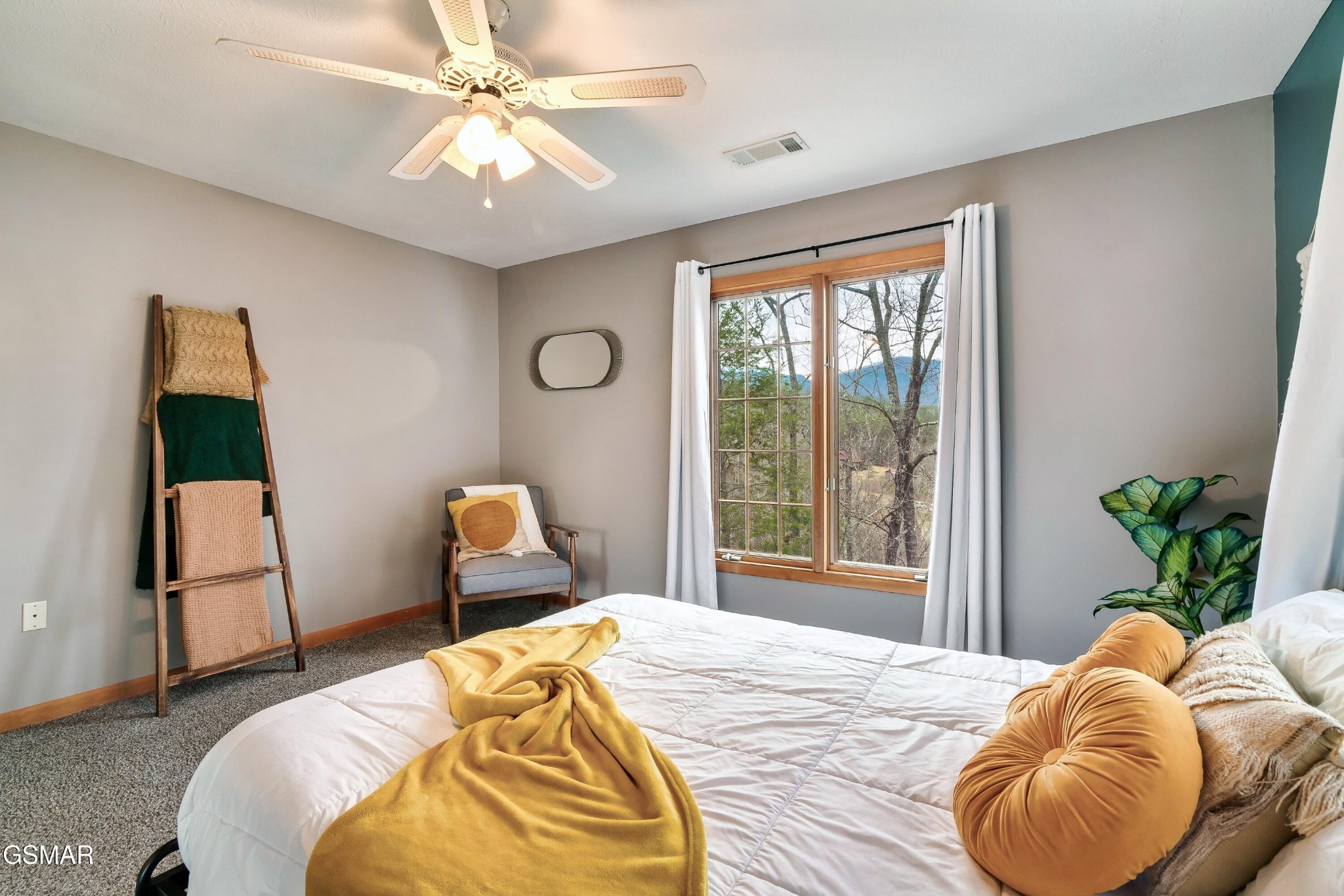 4062 Wilhite Road Sevierville, TN 37876 - Photo 33 of 50 a bedroom with bed and window