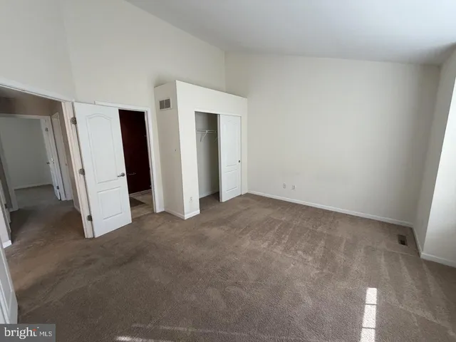 a bathroom with a toilet a sink and bathtub