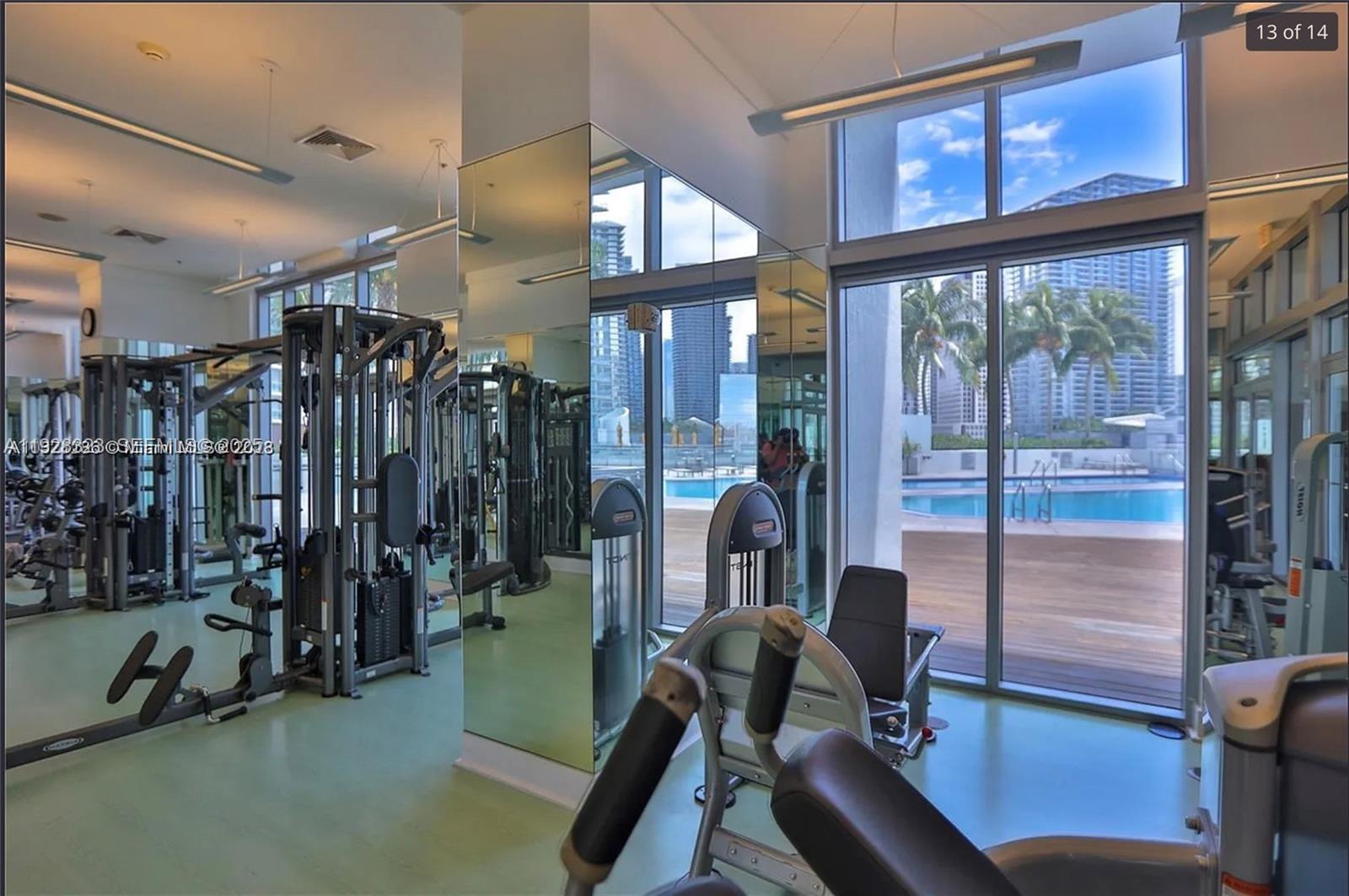 90 Southwest 3rd Street, Unit 3604 Miami, FL 33130 - Photo 12 of 13 a view of a room with gym equipment