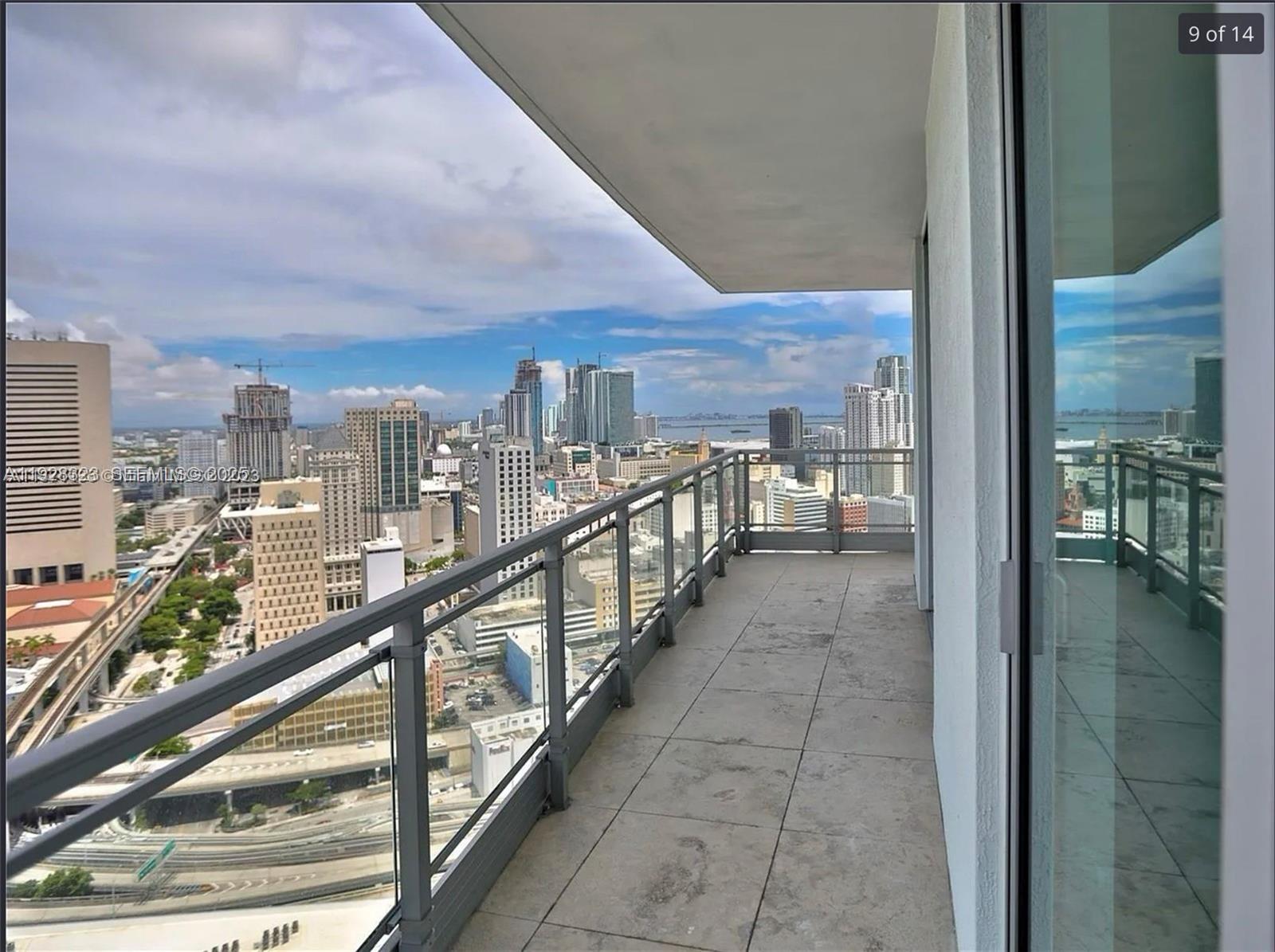 90 Southwest 3rd Street, Unit 3604 Miami, FL 33130 - Photo 9 of 13 a view of city from balcony