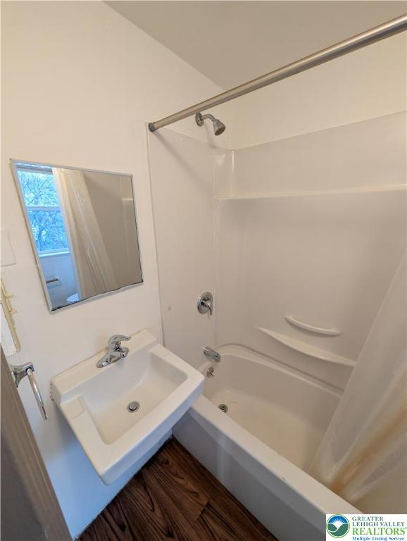 426 Carlton Avenue, Unit 2 Bethlehem, PA 18015 - Photo 14 of 18 a bathroom with a sink and a bathtub