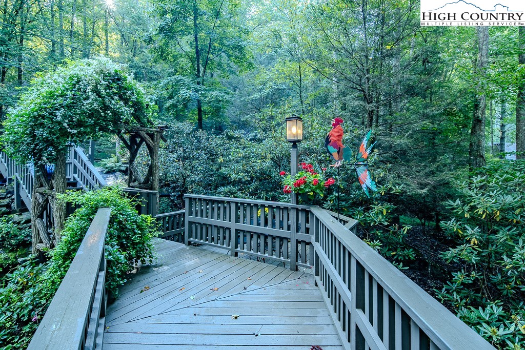335 Cherry Drive Boone, NC 28607 - Photo 25 of 32 a view of a balcony with wooden floor