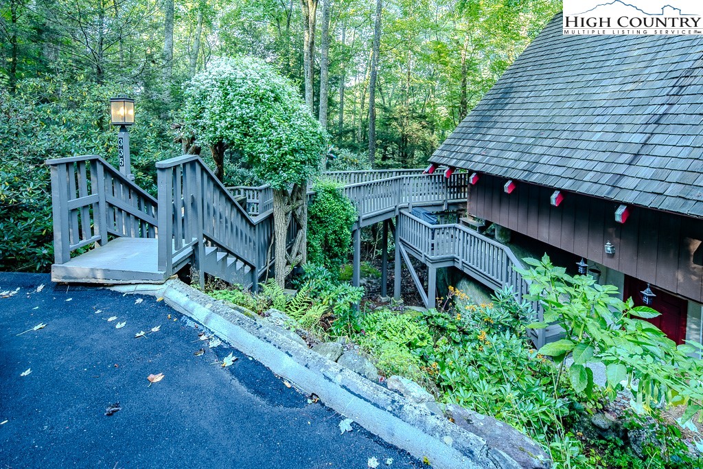 335 Cherry Drive Boone, NC 28607 - Photo 26 of 32 a backyard of a house with lots of green space