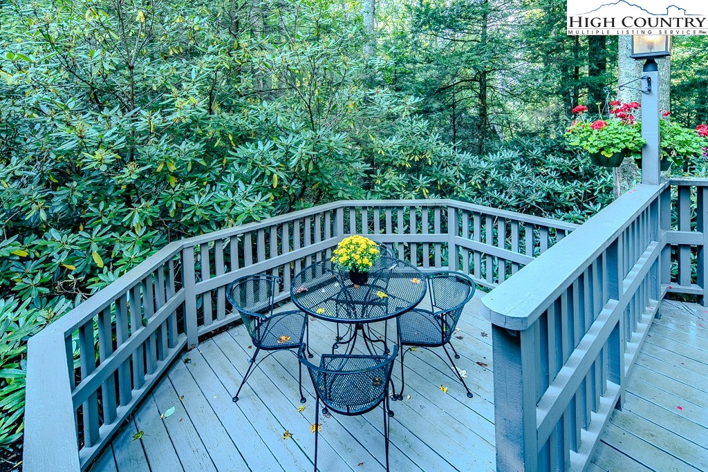 335 Cherry Drive Boone, NC 28607 - Photo 29 of 32 a view of a balcony with chairs